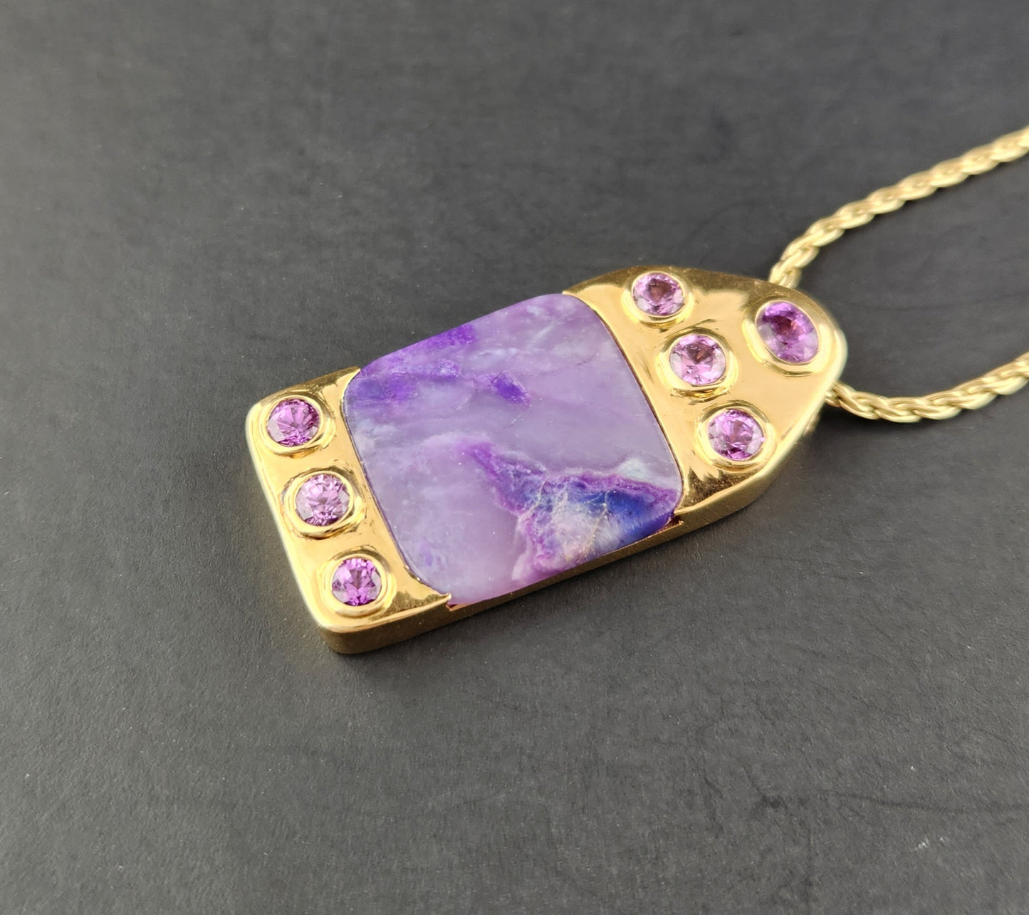 Sugalite and Sapphires Pendant set in 18 ky Gold