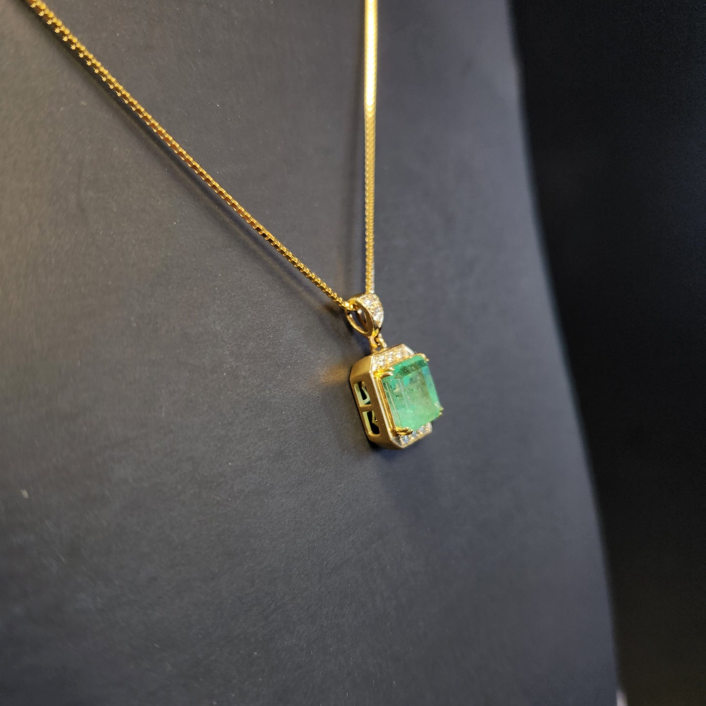 Emerald and Diamond Pendant in 18 ky Gold