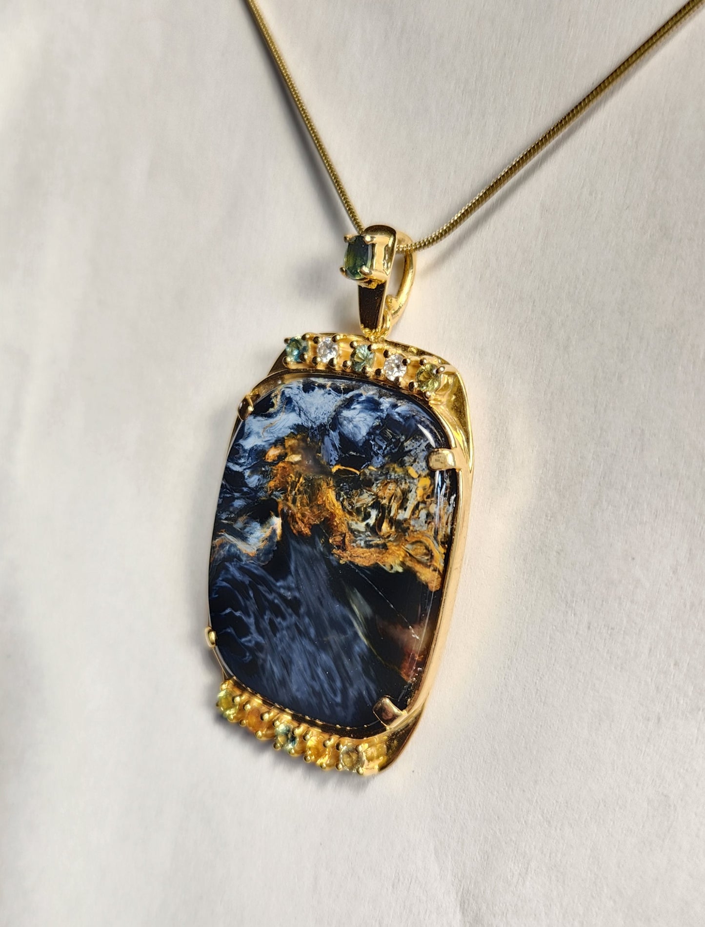 Pietersite ,Diamonds and Sapphires Pendant set in 14ky