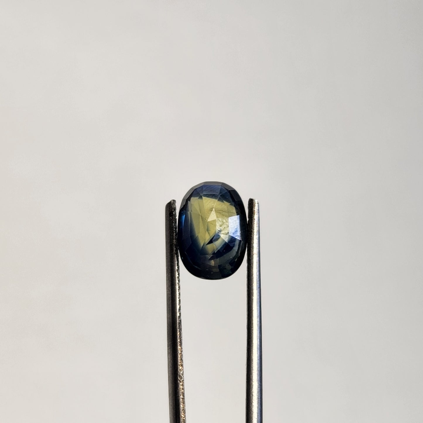 Tri-Colored Blue, Green, and Yellow Sapphire Oval Facet w/ Zonings