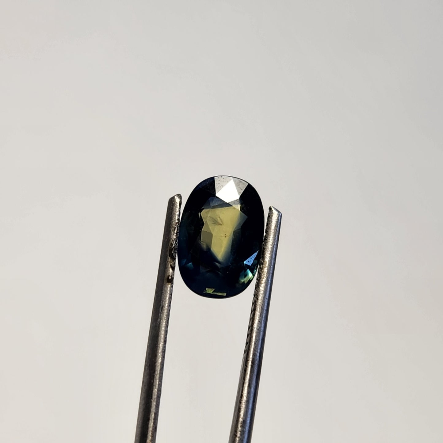 Tri-Colored Blue, Green, and Yellow Sapphire Oval Facet w/ Zonings