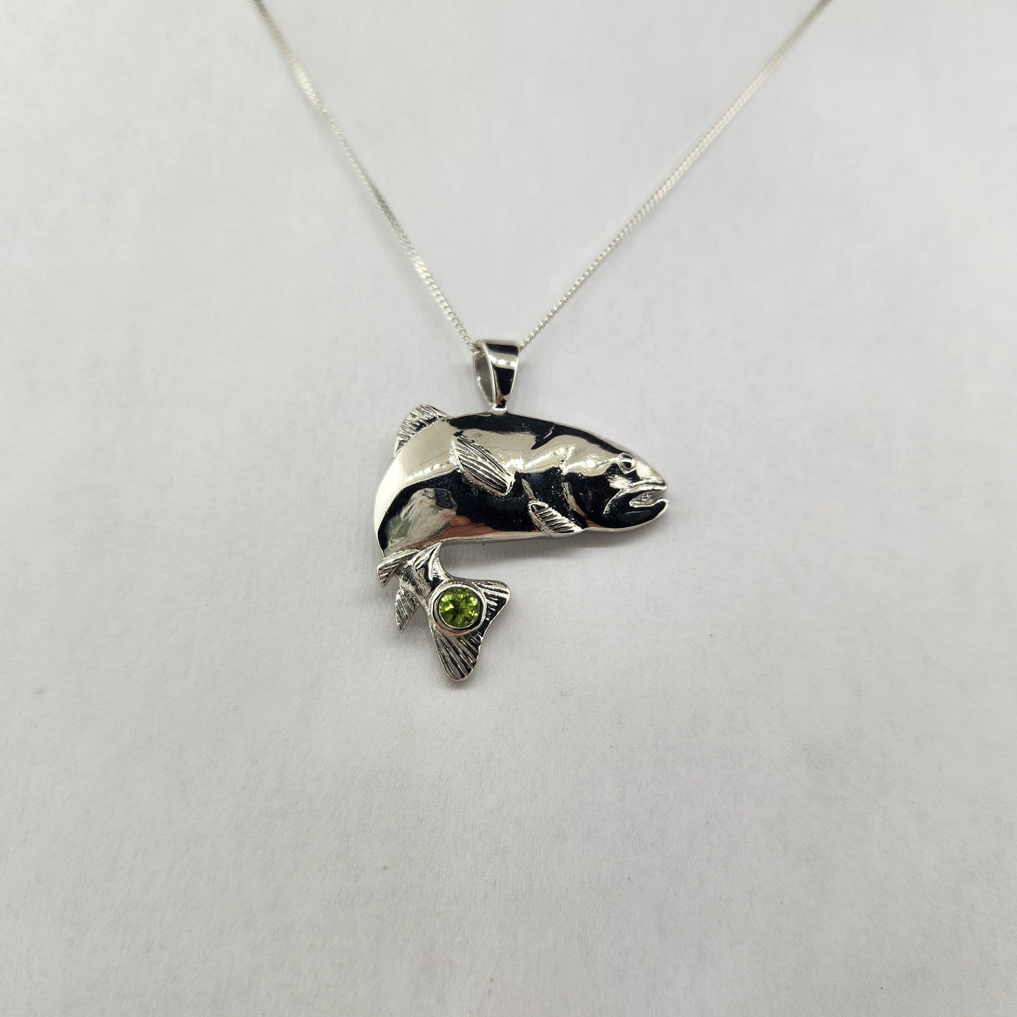 Fish Pendant in Sterling Silver with Peridot