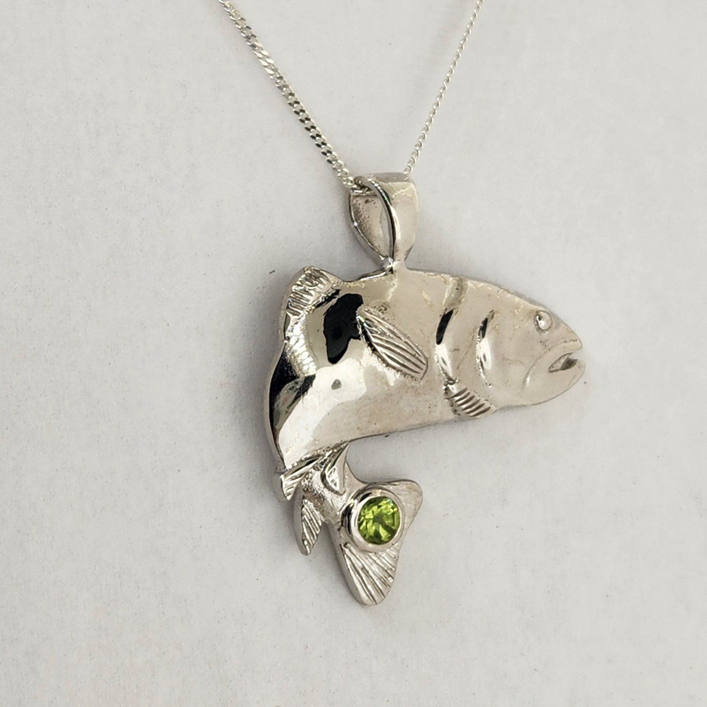 Fish Pendant in Sterling Silver with Peridot