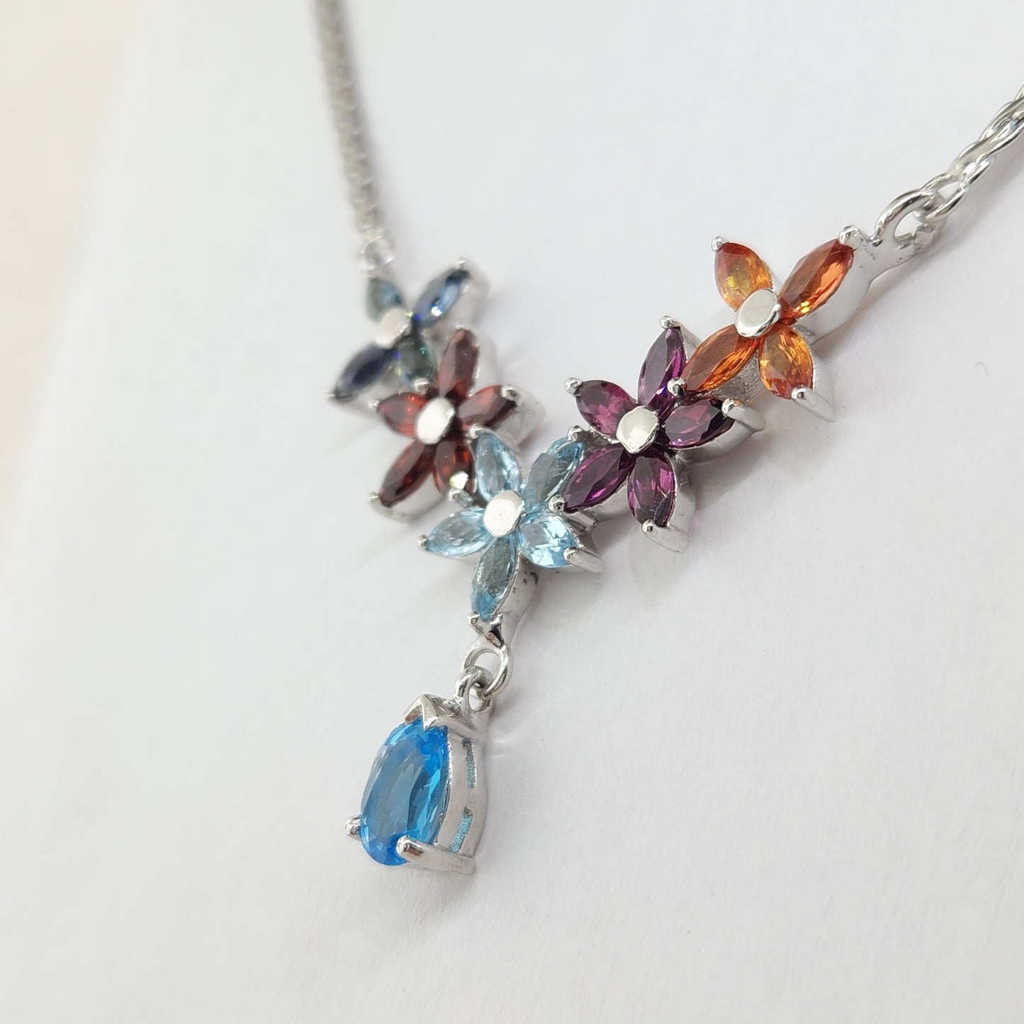 Mixed Stone Blue Topaz, Citrine, and Garnet Pendant in Sterling Silver