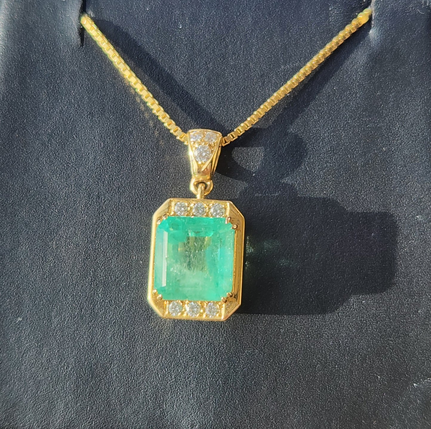 Emerald and Diamond Pendant in 18 ky Gold