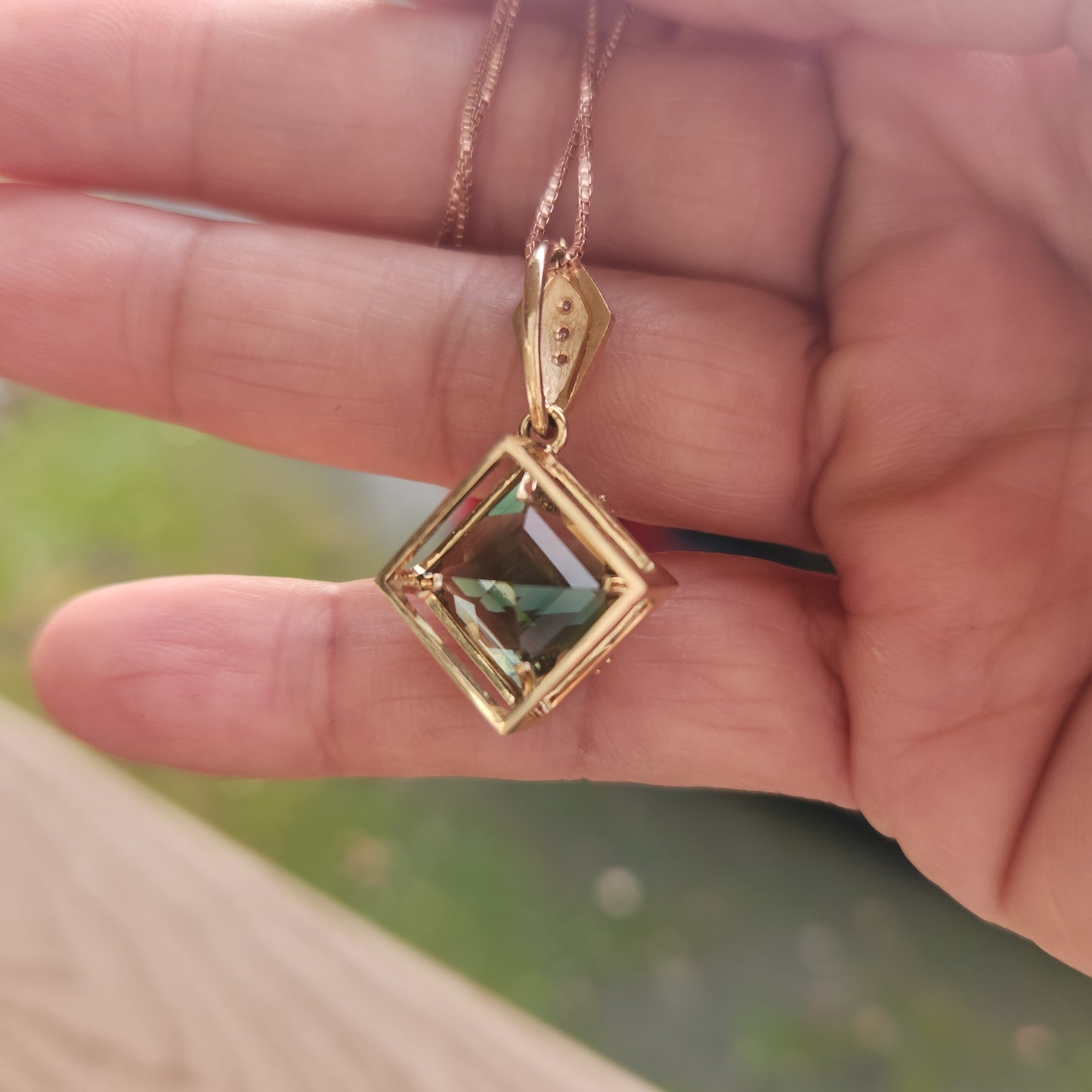 Oregon Sunstone Pendant set in 14 ky with Diamonds