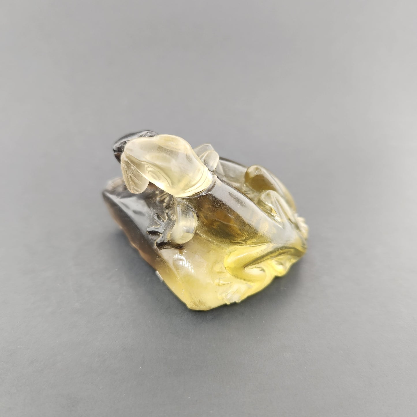 Hand carved Smokey Quartz Lizard.