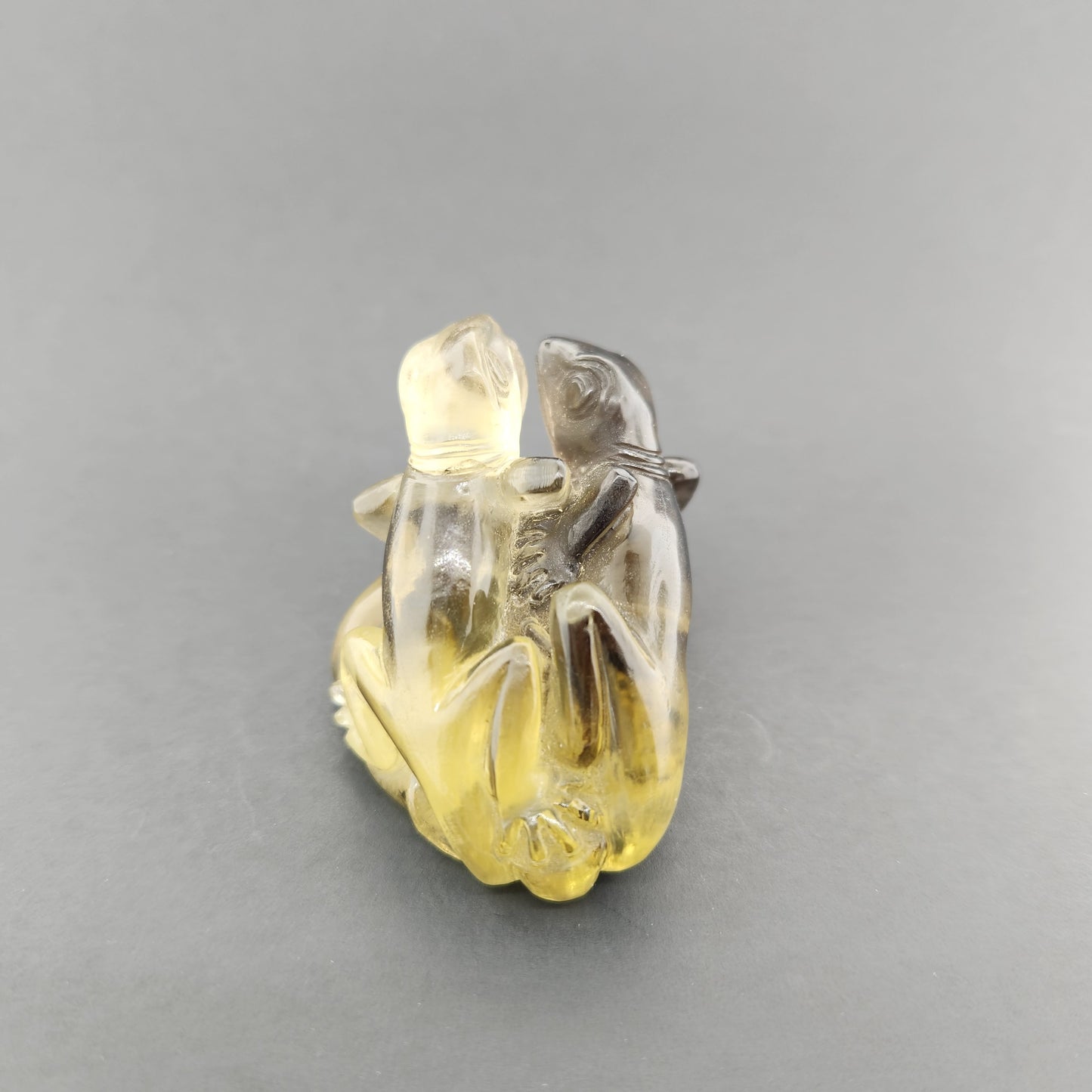 Hand carved Smokey Quartz Lizard.