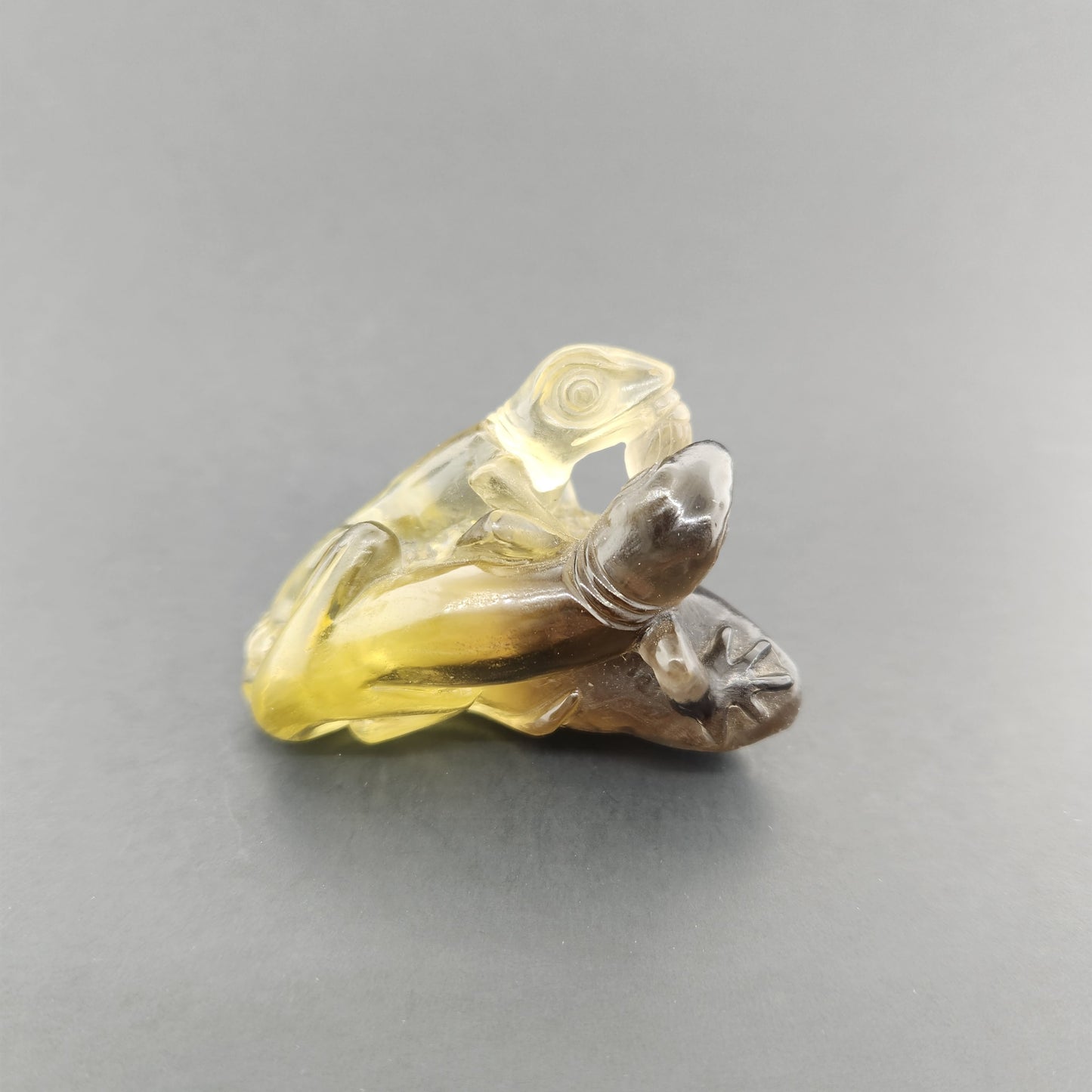 Hand carved Smokey Quartz Lizard.