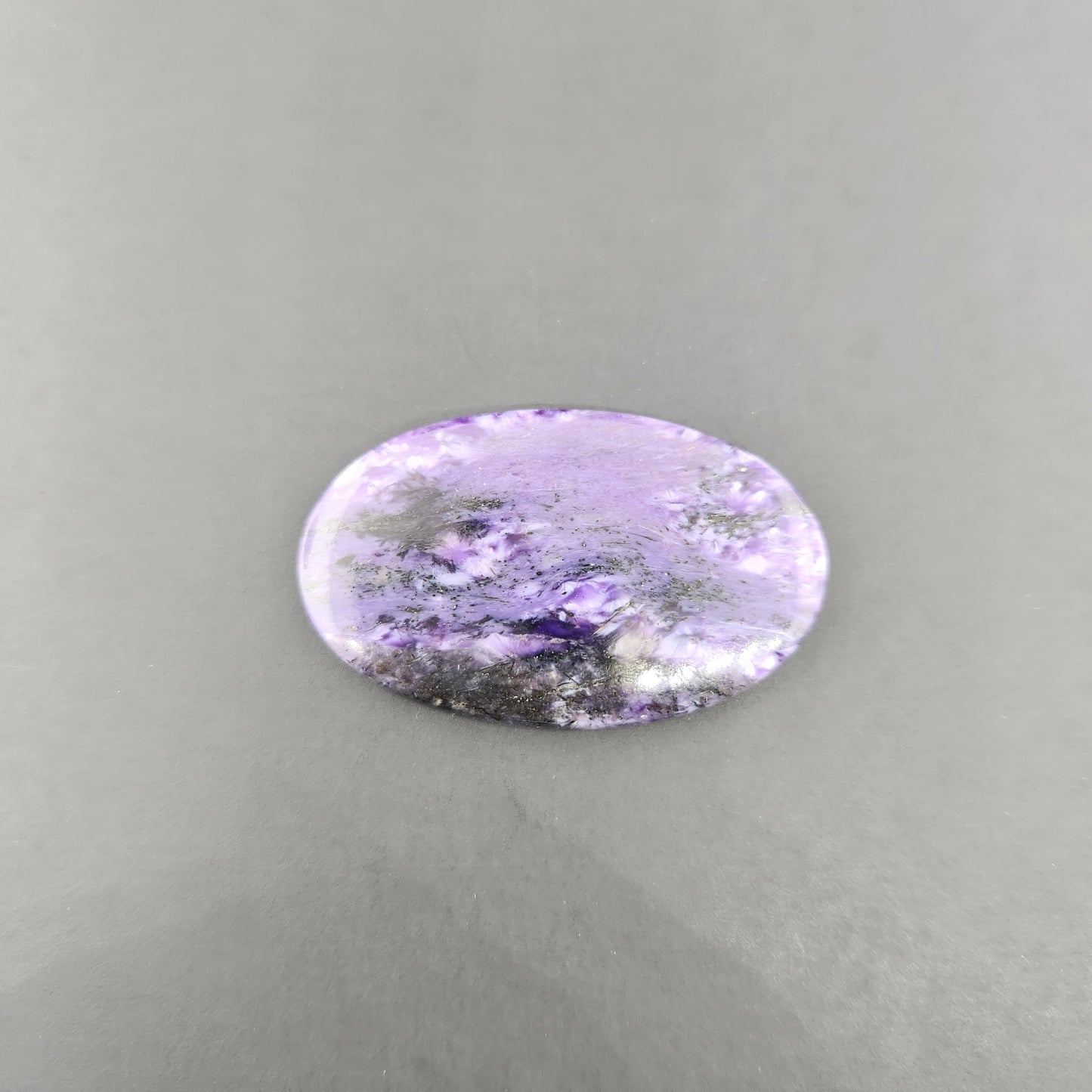 11.73 g Charoite Cabochon.