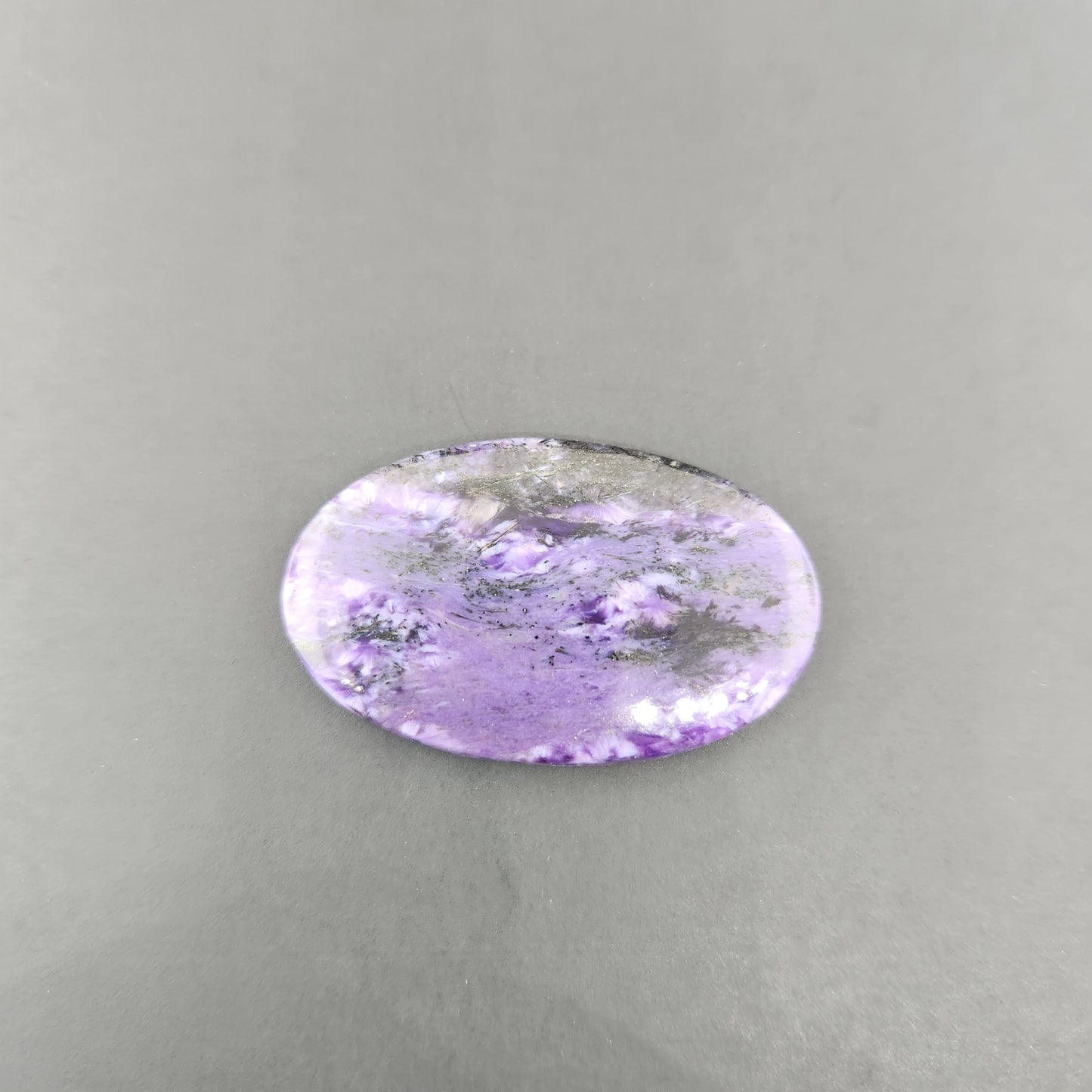 11.73 g Charoite Cabochon.