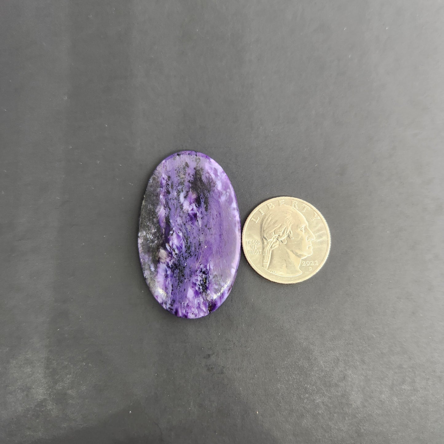11.73 g Charoite Cabochon.