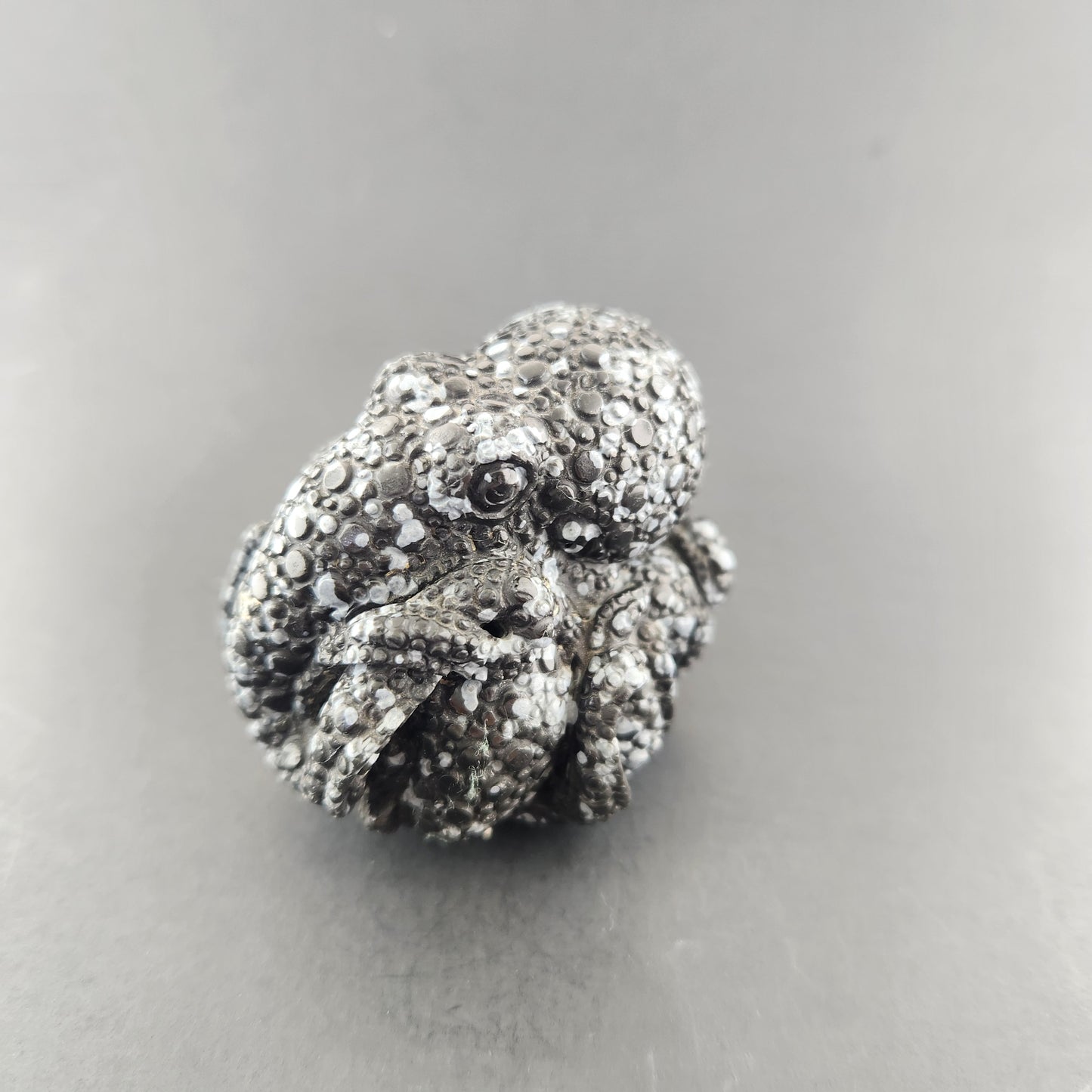 Octopus carved snowflake Obsidian.