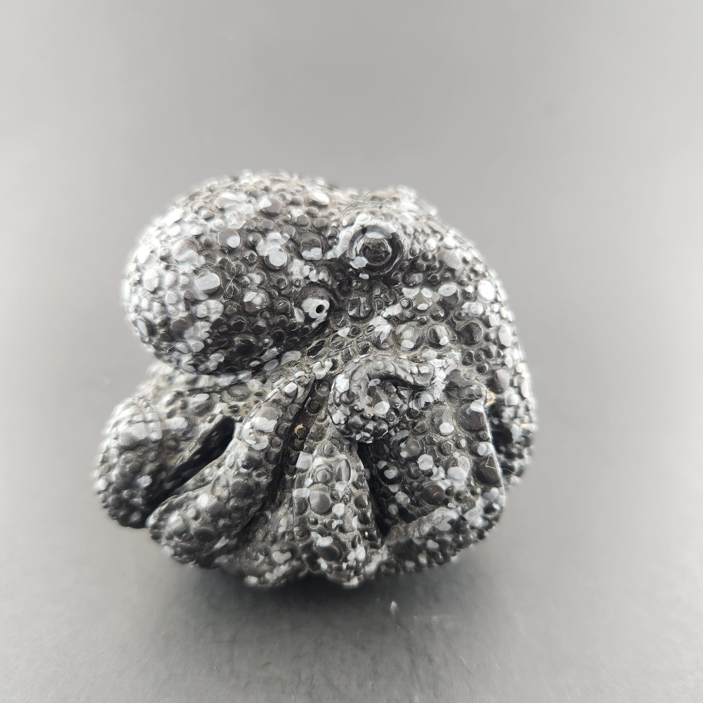 Octopus carved snowflake Obsidian.