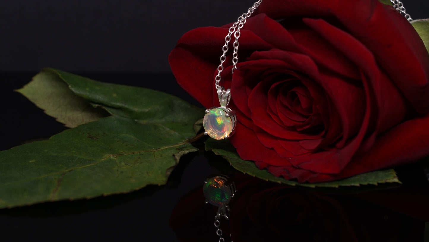 1.13 ct 8 mm Green red and yellow color Ethiopian Opal set in Silver Pendant.