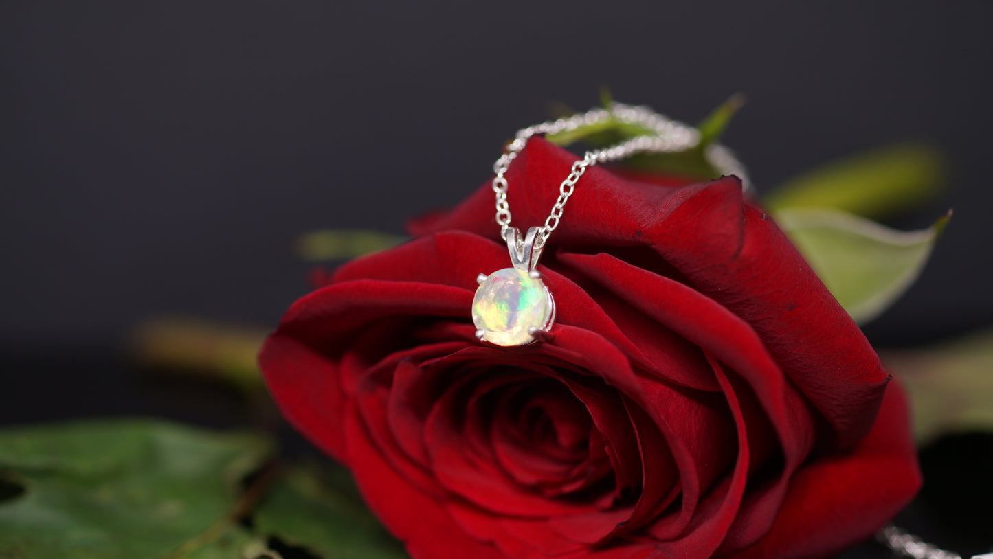 1.13 ct 8 mm Green red and yellow color Ethiopian Opal set in Silver Pendant.