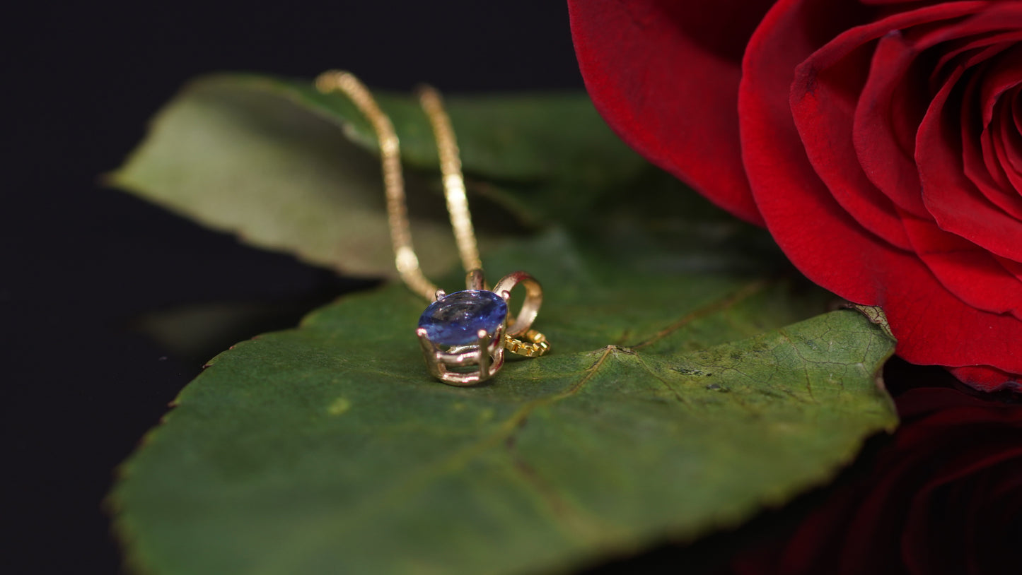 6 mm Sapphire Pendant set in 14k Yellow Gold.