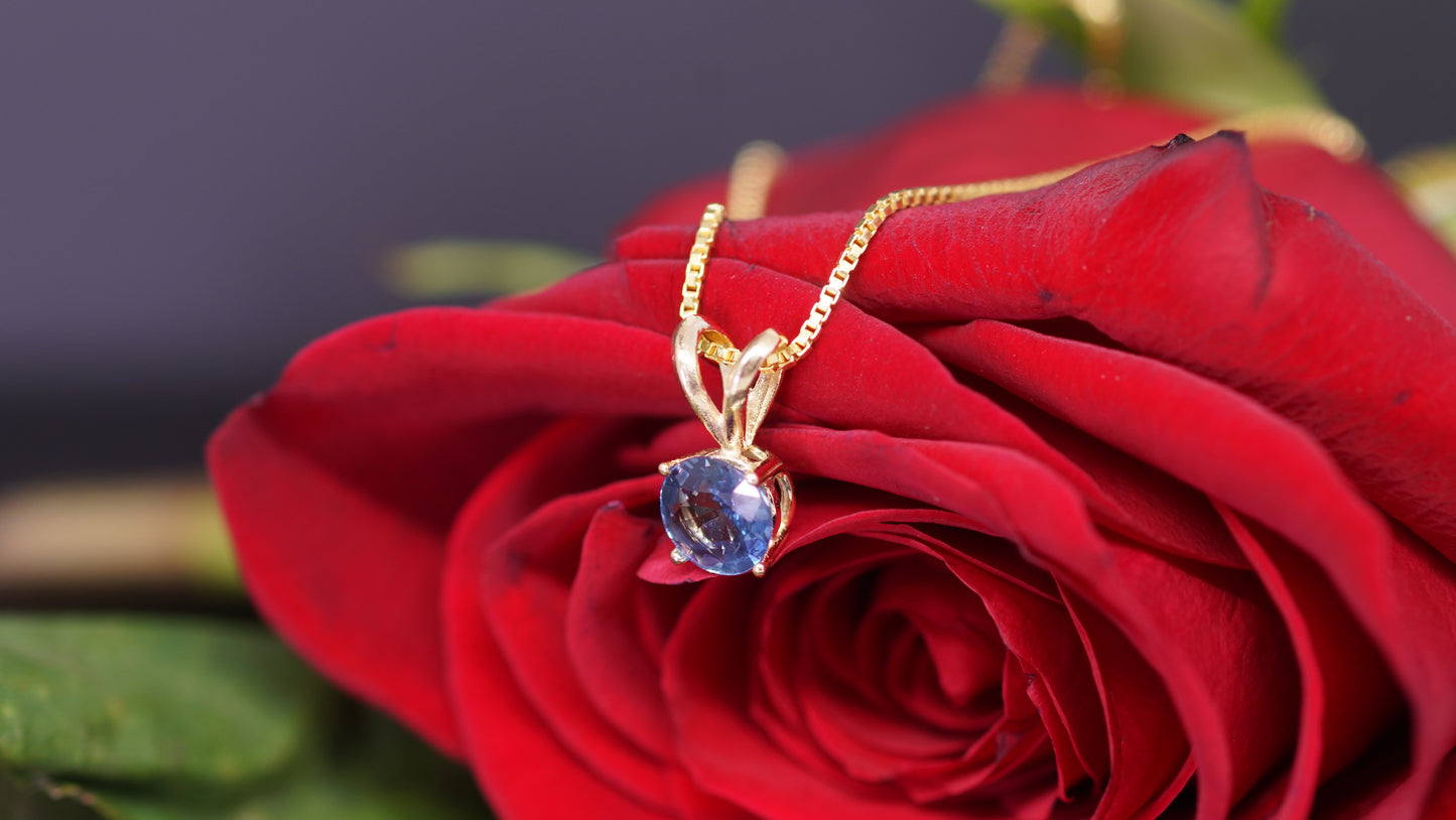 6 mm Sapphire Pendant set in 14k Yellow Gold.