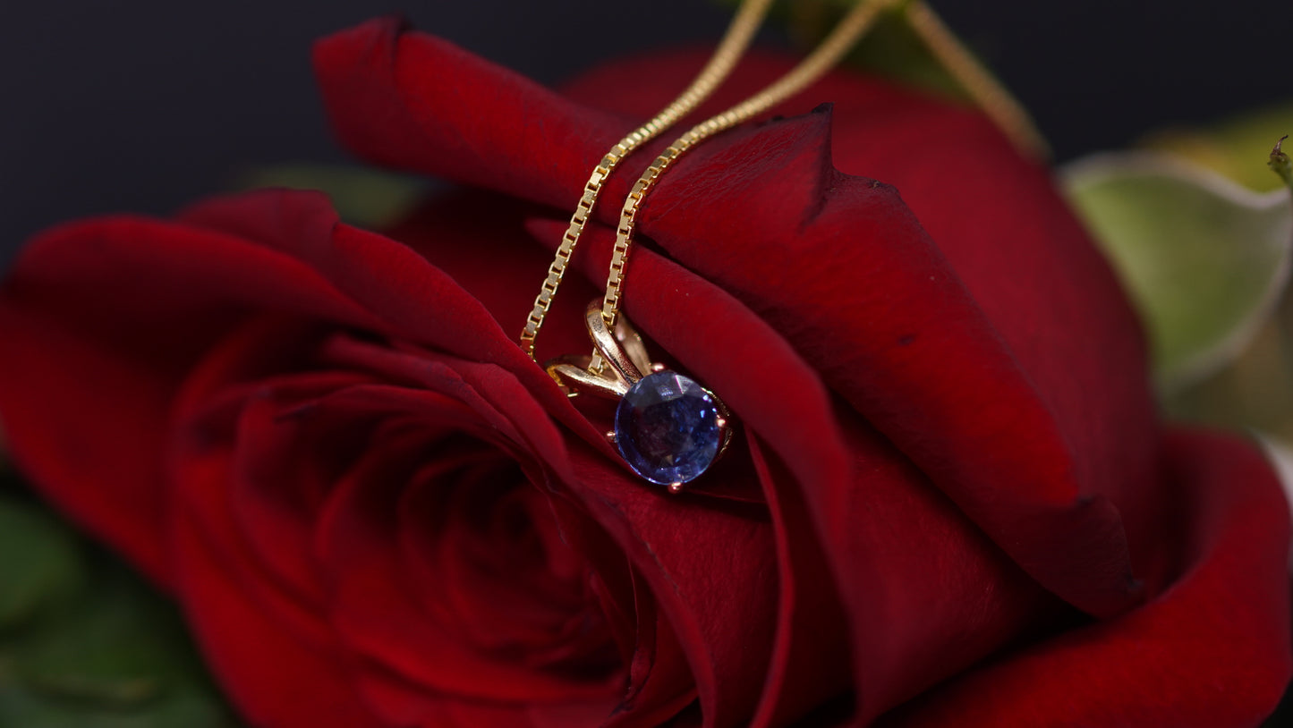 6 mm Sapphire Pendant set in 14k Yellow Gold.