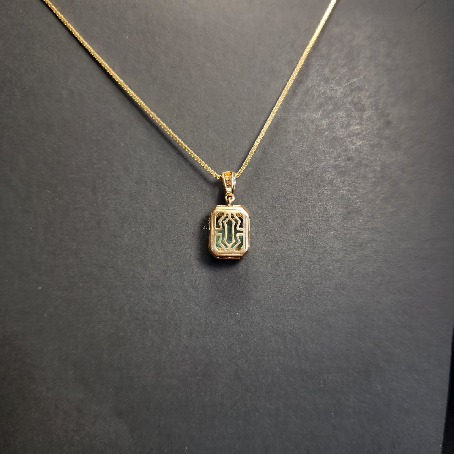 Emerald and Diamond Pendant in 18 ky Gold