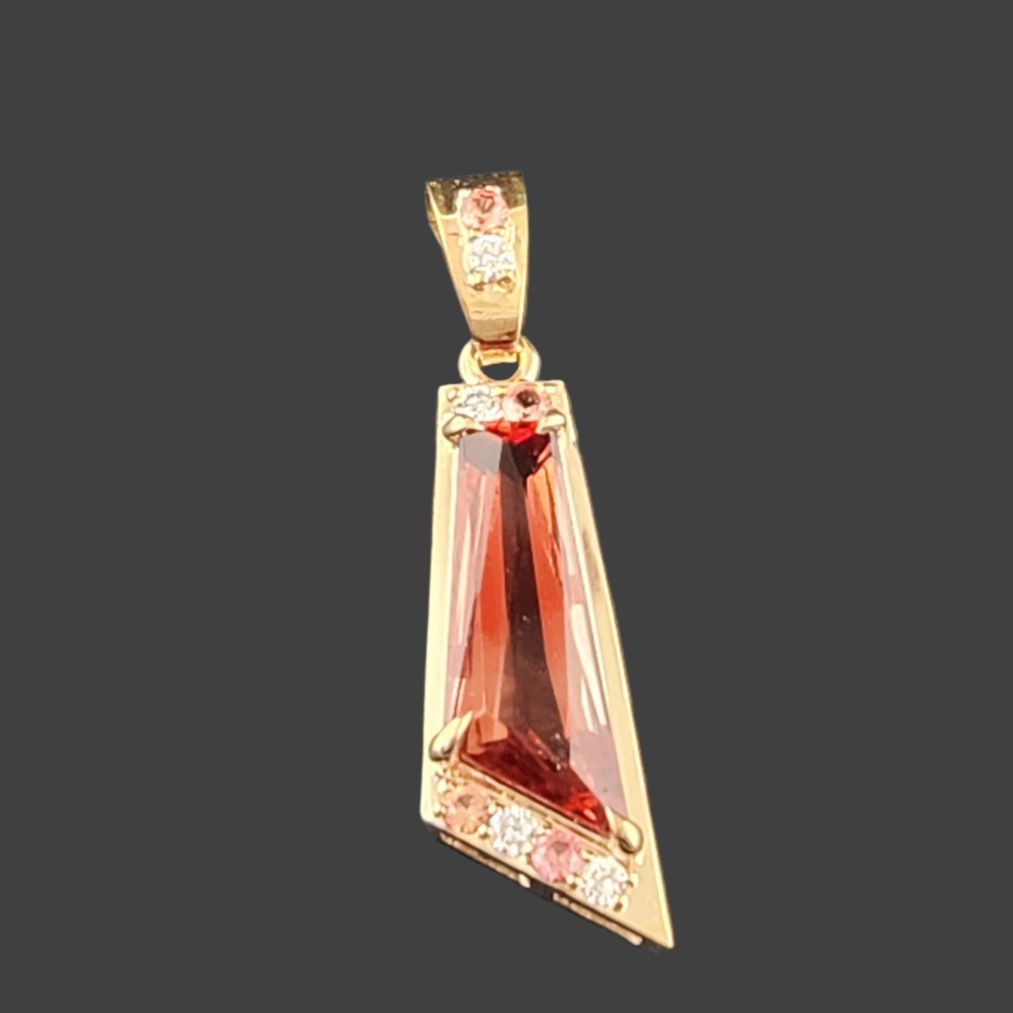 2.89 ct Oregon Sunstone Pendant set in 14 kt yellow Gold with Sapphires and Diamonds.