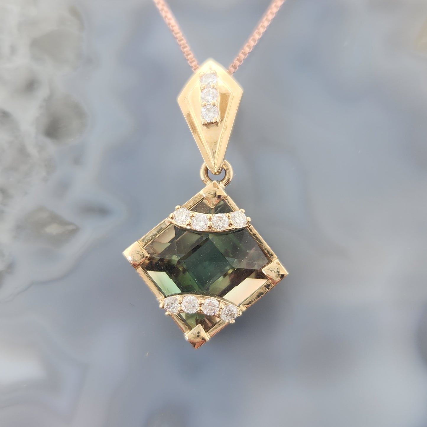 Oregon Sunstone Pendant set in 14 ky with Diamonds