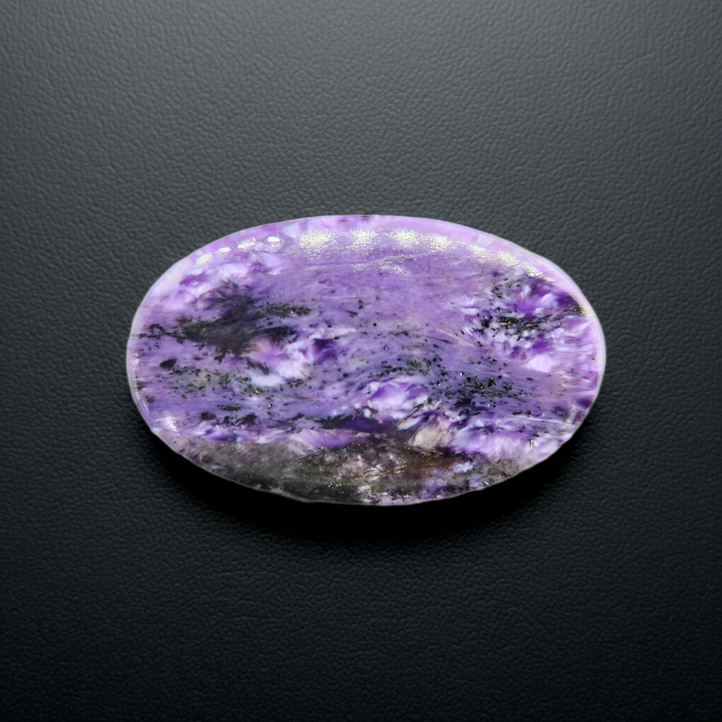 11.73 g Charoite Cabochon.