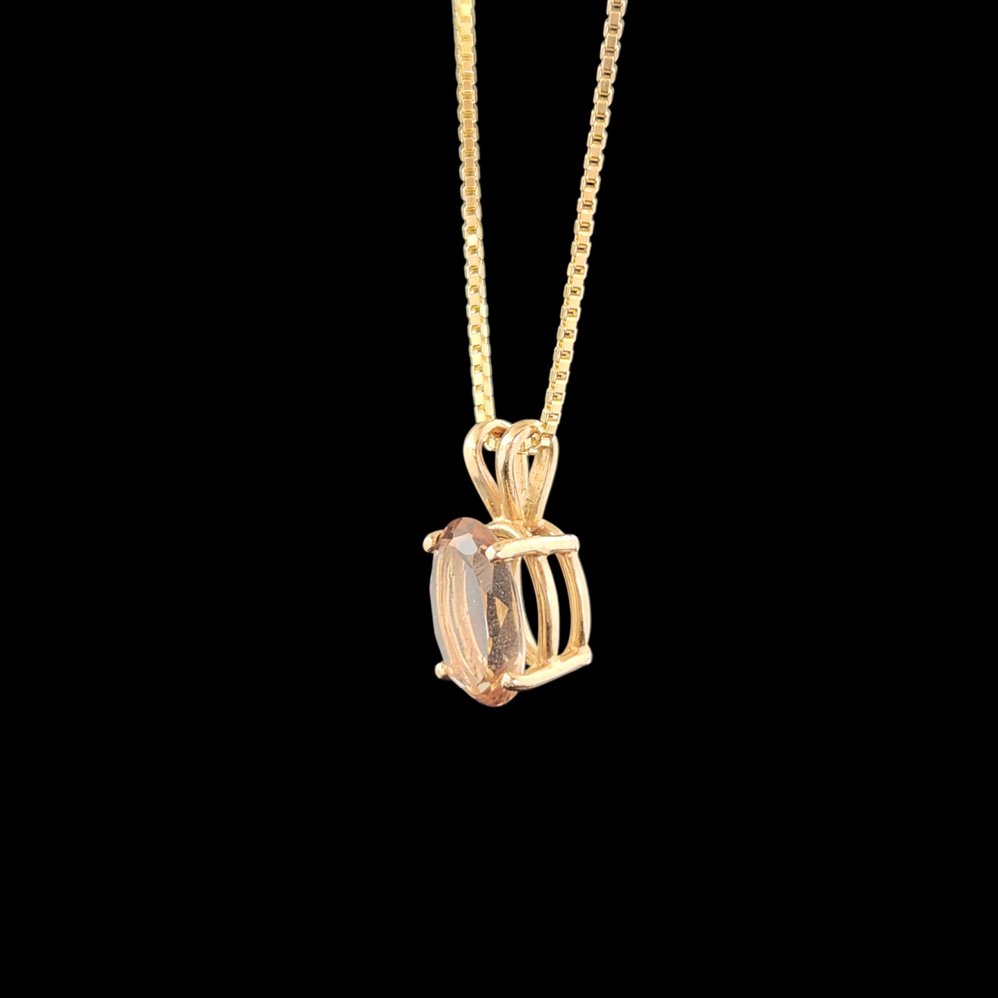 Topaz in 14ky gold pendant