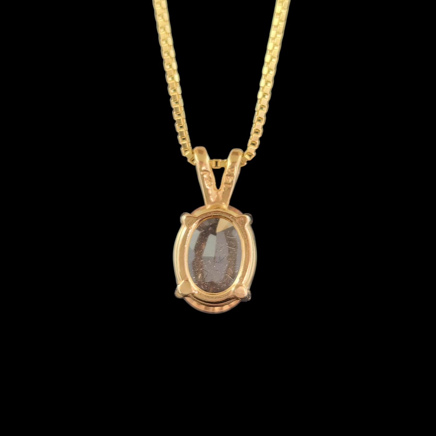 Topaz in 14ky gold pendant