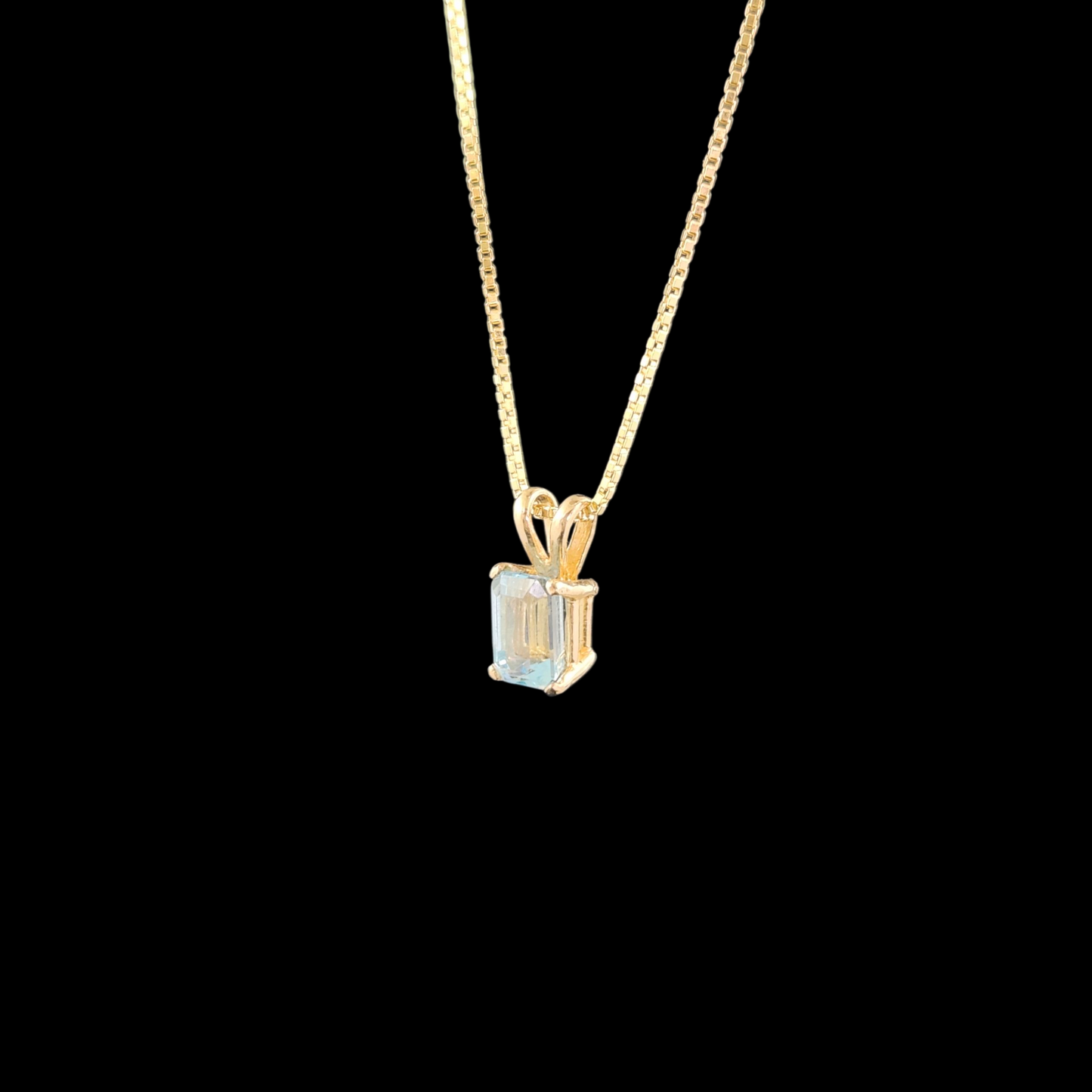 Topaz in 14ky gold pendant