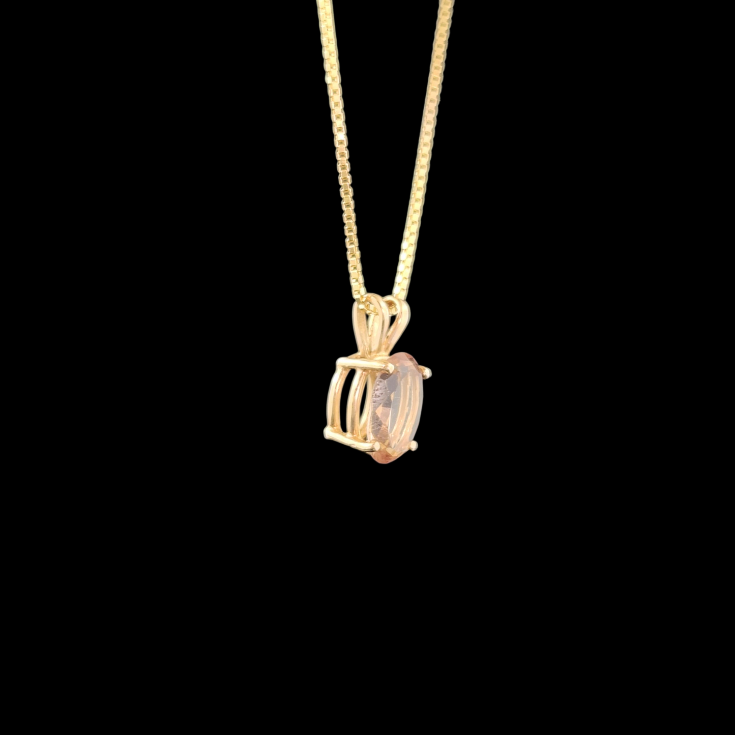 Topaz in 14ky gold pendant